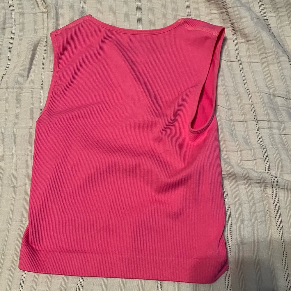 a new day! pink tank top!! size is small!!